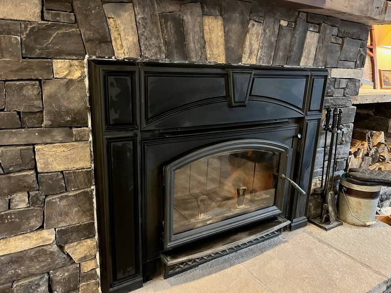Fireplace insert installed in a home
